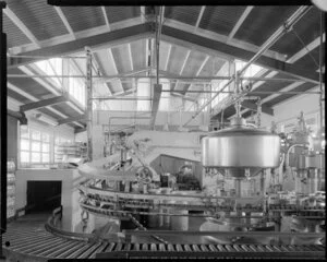 Interior of unidentified dairy factory, bottling plant