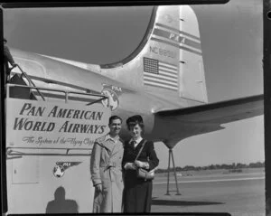 Leslie Flood and [wife], next to Pan America World Airways Clipper