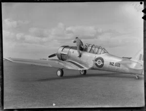 Auckland Aero Pageant, pilot disembarking from Harvard aircraft