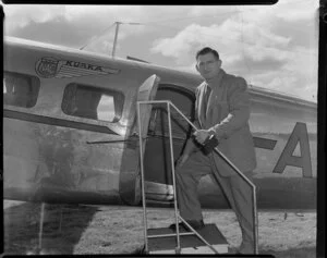 Earl McCready, first passenger to fly with New Zealand National Airways Corporation, ZK-AFD Electra, Kuaka, opening day, Rotorua