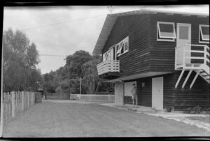 Exterior of house made of timber and stone