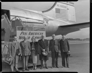 Pan American World Airways passengers, Mr and Mrs Broers with a group of unidentified men