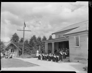 Children performing for Sir Peter Buck at his welcoming ceremony, [Horohoro school, Rotorua?]