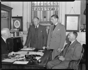 Kempthorne Prosser and Company employees Mr Foote and Mr Phillips and two other unidentified men in the office