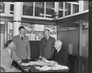 Kempthorne Prosser and Company employees Mr Foote and Mr Phillips and two other unidentified men in the office