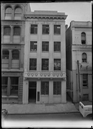 Elliott Block, Auckland with the window advertising R H Exton & Co, clothing manufacturers