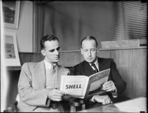 Mr Hardinge (right) and Mr Harkness with a magazine advertising Shell