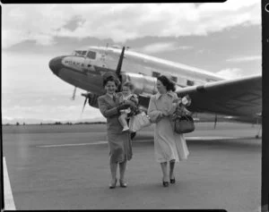 Miss Penner, Christchurch airport hostess, with passengers