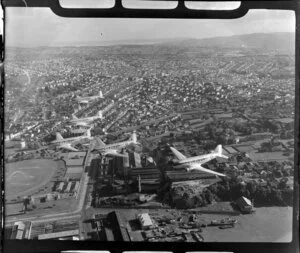 RNZAF (Royal New Zealand Air Force) Squadron 41, flying DC4 airplanes over Auckland