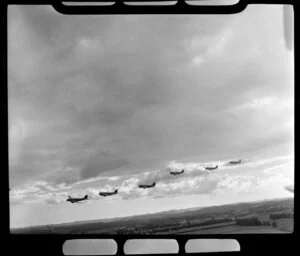 RNZAF (Royal New Zealand Air Force) Squadron 41, flying information over Whenuapai airbase, Waitakere City, Auckland