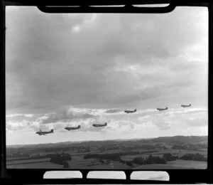 RNZAF (Royal New Zealand Air Force) Squadron 41, flying information over Whenuapai airbase, Waitakere City, Auckland