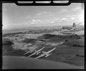 RNZAF (Royal New Zealand Air Force) 41 Squadron, Dakota airplanes flying over Whenuapai airbase, Waitakere City, Auckland