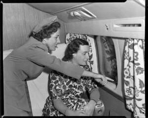 Miss Gwen Robyns and air hostess Judith Marchant on the DC6 RMA Adventurer, British Commonwealth Pacific Airlines