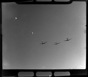 Royal New Zealand Air Command RAC Pageant at Mangere, Douglas Dakota aircraft dropping supplies by parachute