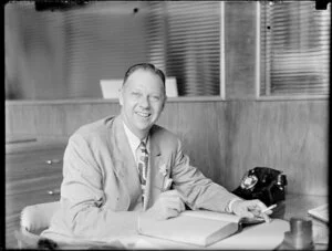 Mr T Parker Junior sitting in his office, Honolulu