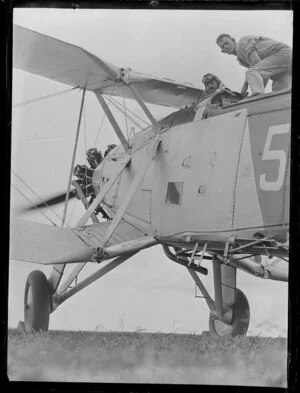 Two unidentified men in the cockpit of the Blackburn Baffin biplane at its first test flight, Hobsonville, Royal New Zealand Air Force air sales