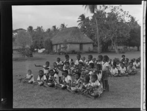 Young boys performing at the meke, Vuda village, Fiji