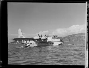 Tasman Empire Airways Limited Short S.45 Solent flying boat, R.M.A Araragi (ZK-AMM), is moored after having landed at Evans Bay, Wellington