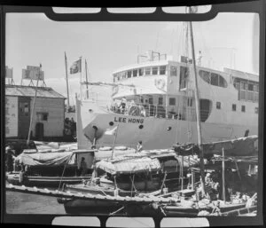 Ship Lee Hong Ferry and smaller craft near ferry terminal, Hong Kong