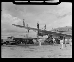 Qantas Empire Airways Lockheed L749-79 Constellation (VH-EAB) aircraft Lawrence Hargrave being re-fuelled at Kallang Airport, Singapore, by a Shell tanker