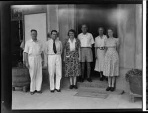 Six unidentified men and women outside the Northern Hotels, Fiji