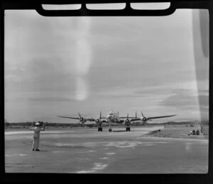 The British Overseas Airways Corporation Lockheed L-749 Constellation (G-ALAN) aircraft Beaufort, is directed by an aircraft marshall at Kallang Airport, Singapore