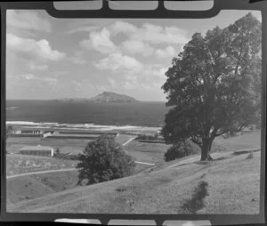 View over a building and old gaol walls to the sea and an island, Kingston, Norfolk Island