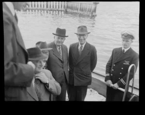 On board the Tasman Empire Airways Ltd Short Solent flying boat in Sydney are from left G N Roberts, T A Barrow, airline director Sir Wilmot Hudson Fysh