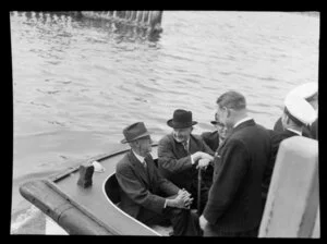 On board the Tasman Empire Airways Ltd Short Solent flying boat in Sydney are from left A E Rudder, T A Barrow, airline director Sir Wilmot Hudson Fysh