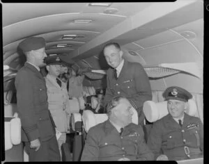 Men from the Air Force Reserve inside an aircraft [seaplane], Mechanics Bay, Auckland
