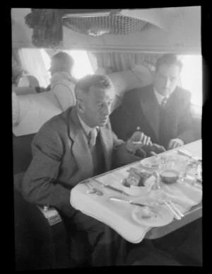 W Ellison (left) on board the Tasman Empire Airways Ltd Short Solent flying boat, Sydney to Auckland flight