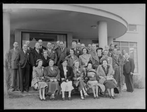 Group of women and men assembled outside a building for the Auckland Aero Club 21st Anniversary