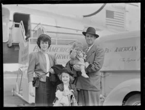 Passengers Mr and Mrs Abbot and family having arrived on a Pan American World Airways flight, location unknown