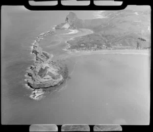 Castlepoint lighthouse showing cliffs and beach, Masterton