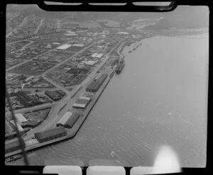 Dunedin showing waterfront area. Unidentified ship at dock.