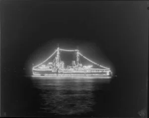 HMNZS Bellona lit up at night during the 100th Anniversary Day regatta, Auckland Harbour