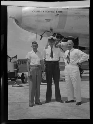 Qantas Empire Airways Lockheed Constellation aircraft VH-EAD, Charles Kingsford Smith, at Tengah Airport, Singapore, from left are Leo White, Captain J C Pollock, Captain F Ambrose