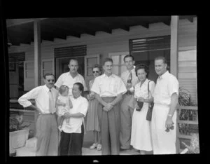 From left are G Day, Amah with D Day, P Hewitt, J Day, Mr Addison, E Fisher, C Jackson, J Walters, Qantas Empire Airways, Singapore