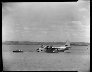 Tasman Empire Airways Ltd, Solent IV flying boat, RMA Awatere, ZK-AMN, tied to a buoy, Mechanics Bay, Auckland
