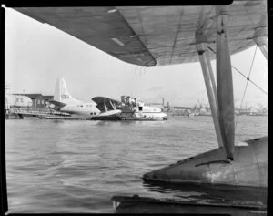 Tasman Empire Airways Ltd, Solent IV flying boat, RMA Aotearoa II, ZK-AML, side view, tied up at the pontoon, Mechanics Bay, Auckland