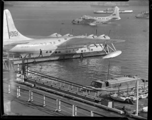 Tasman Empire Airways Ltd, Solent IV flying boat, RMA Aotearoa II, ZK-AML (foreground), and RMA Aranui, ZK-AMO, Mechanics Bay, Auckland