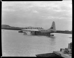 Tasman Empire Airways Ltd, Solent IV flying boat, RMA Aotearoa II, ZK-AML, heading for buoy, Mechanics Bay, Auckland