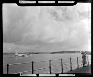 Tasman Empire Airways Ltd aircraft taking off, Mechanics Bay, Auckland