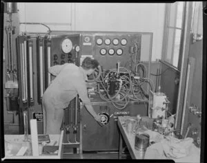 Carburettor testing, Tasman Empire Airways Ltd workshop, Mechanics Bay, Auckland
