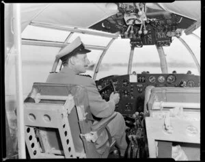 Captain Griffiths, Tasman Empire Airways Ltd at the controls of an aircraft