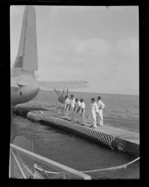 Inauguration flight, Suva to Auckland, flying boat leaving the pontoon