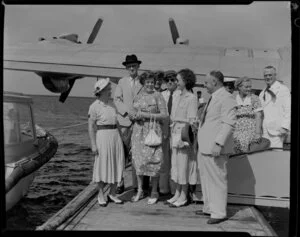 Tasman Empire Airways Ltd, courtesy flight, Governor of Fiji, Sir Leslie [Brian?] Freeston, Lady Freeston and other embarking passengers, Suva, Fiji