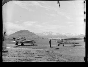 A Auster aircraft, ZK-APO, and a Proctor aircraft, Southern Scenic Air Services, Queenstown