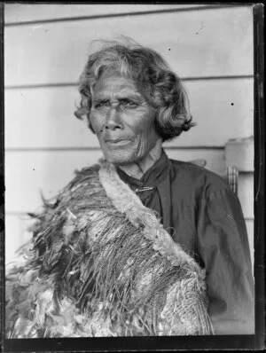 Portrait of Maori kuia wearing a traditional feather cloak [Orakei Korako?]