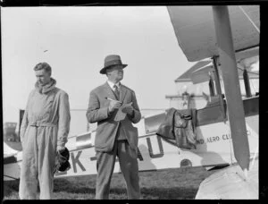 Stuart Grant-Dalton and an unidentified man beside an Auckland Aero Club aircraft